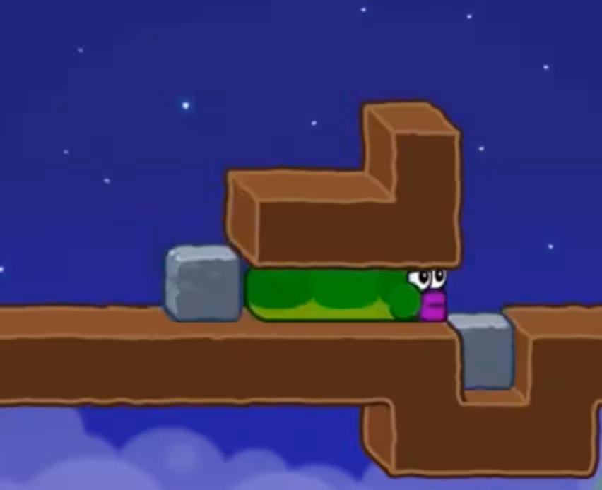 Apple Worm Level 16 Step 4: Fit the block into the dirt pit to create a bridge
