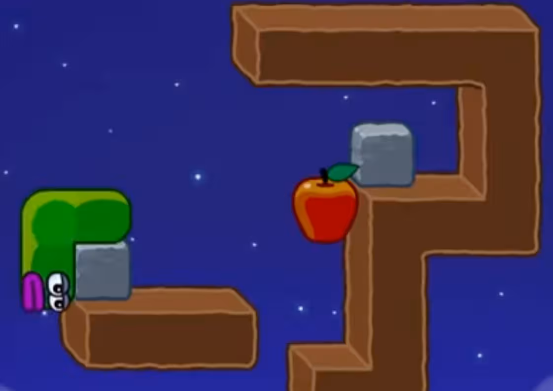 Apple Worm Level 17 Step 1: Move to the left side of the stone block to prepare a right push