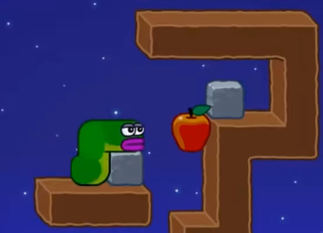 Apple Worm Level 17 Step 2: Push the stone block to the right edge of the dirt block