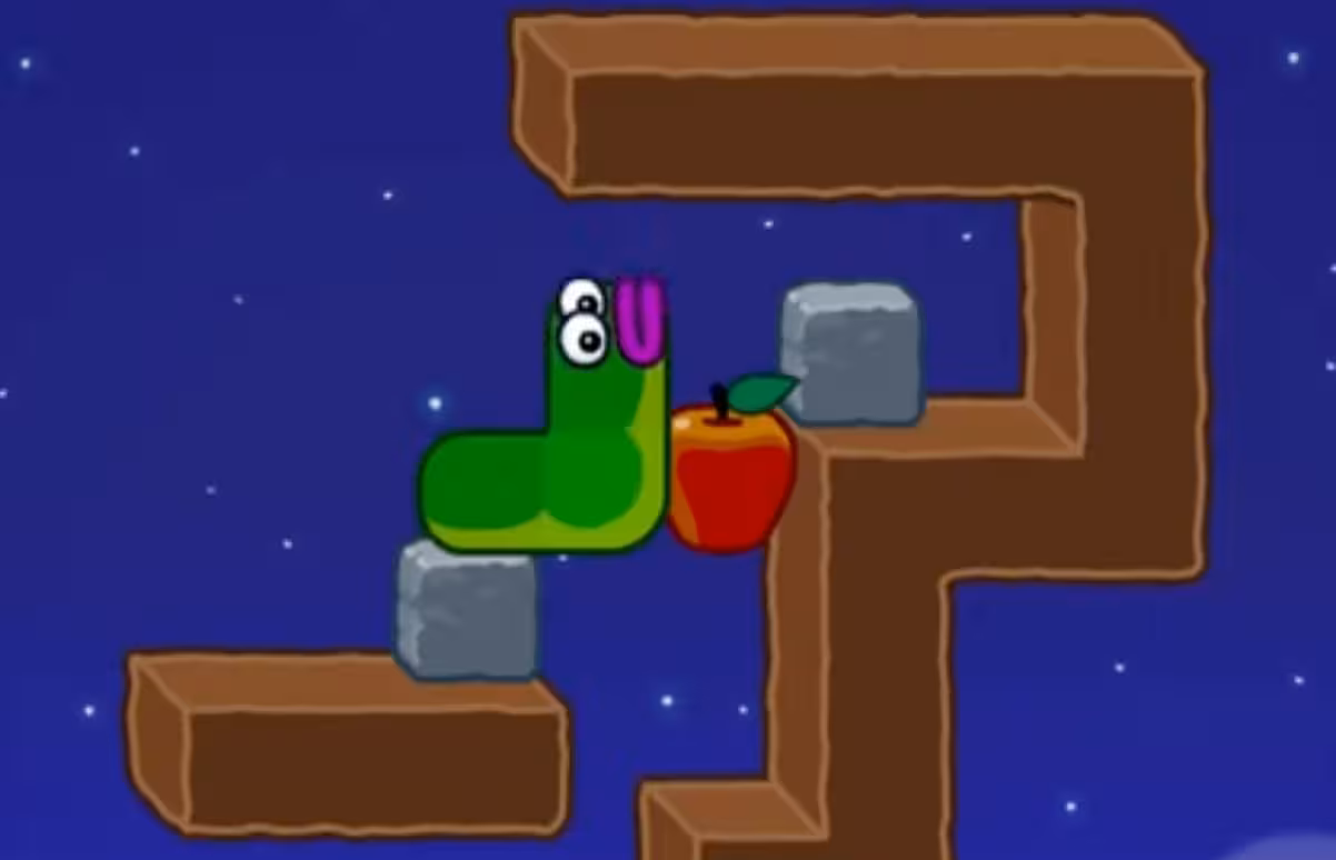 Apple Worm Level 17 Step 3: Use the stone block and the apple to climb to the right-side stone block