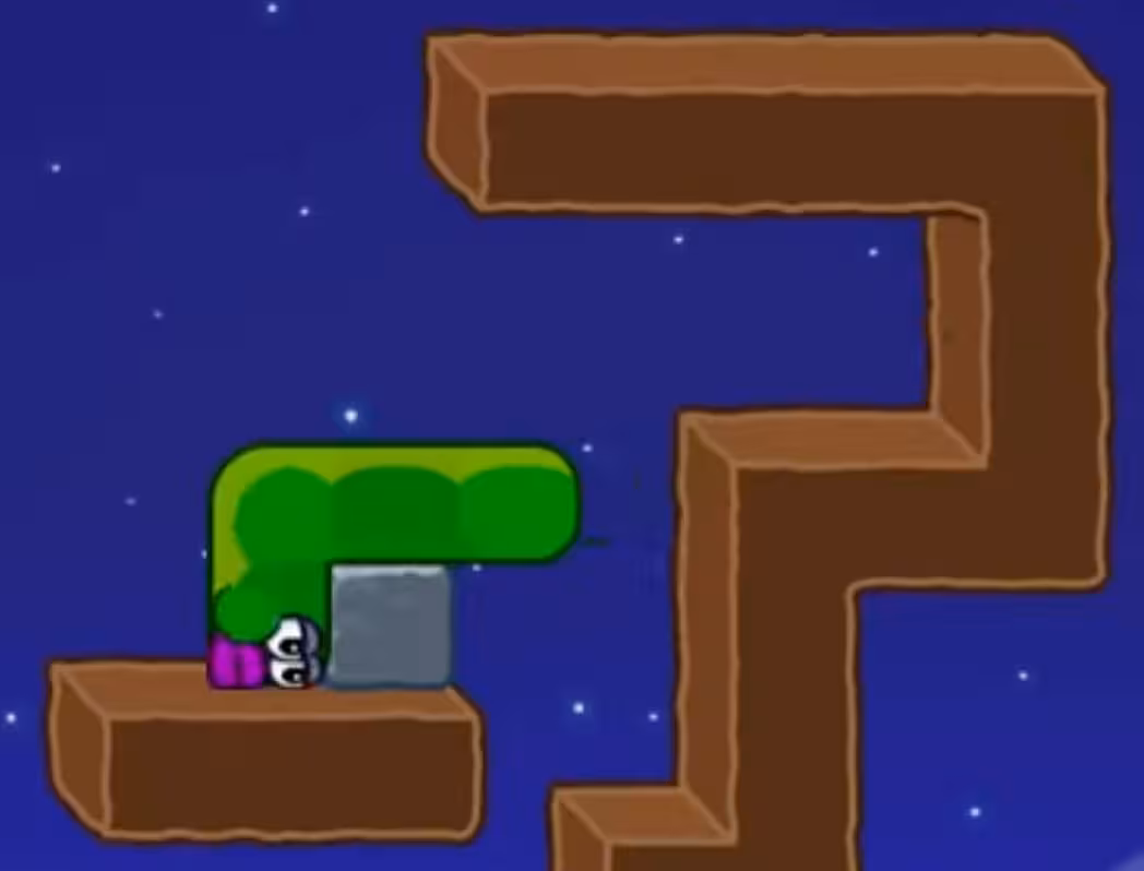 Apple Worm Level 17 Step 5: Move down to eat the apple, then move left to the stone block's left side