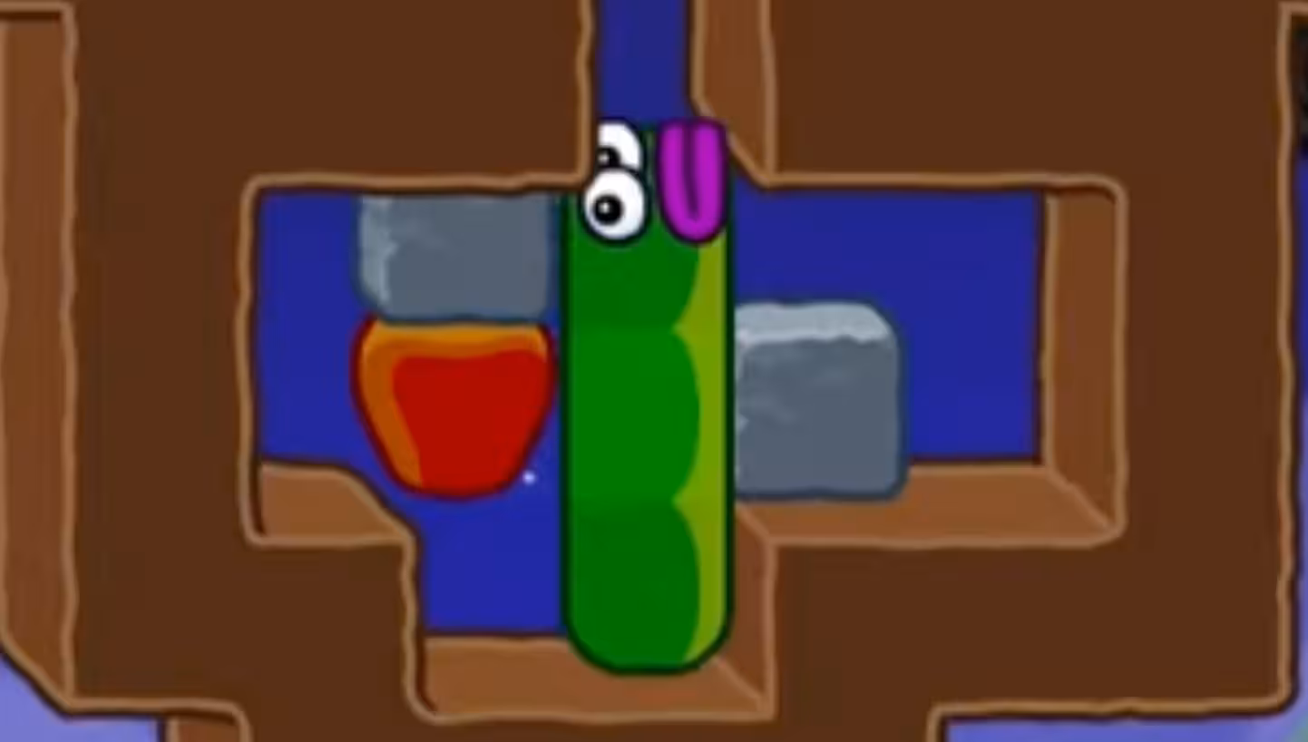 Apple Worm Level 18 Step 2: Move up to the end and let the worm naturally drop onto the lower dirt block