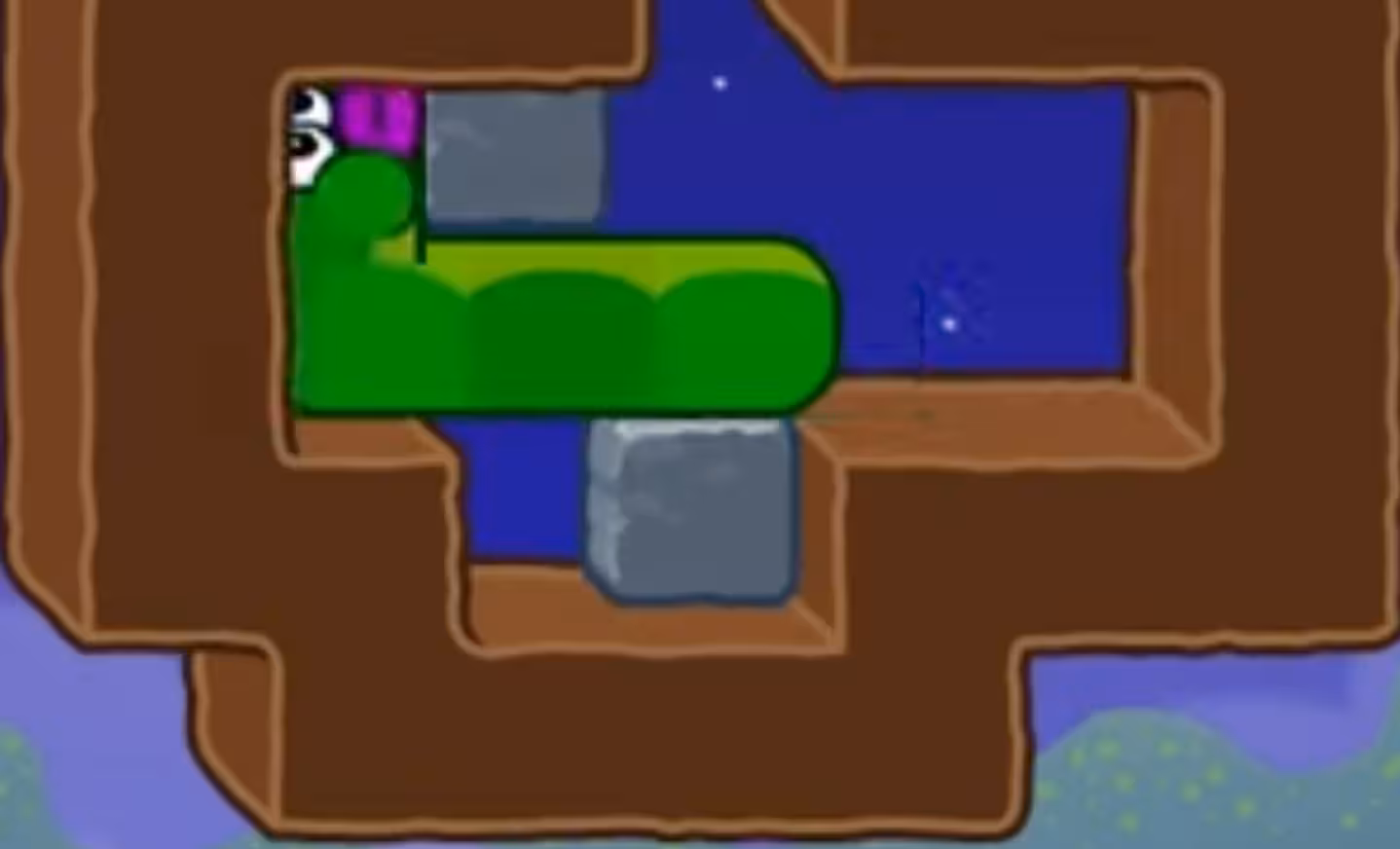 Apple Worm Level 18 Step 5: Move to the left side of the upper stone block to prepare the stack push