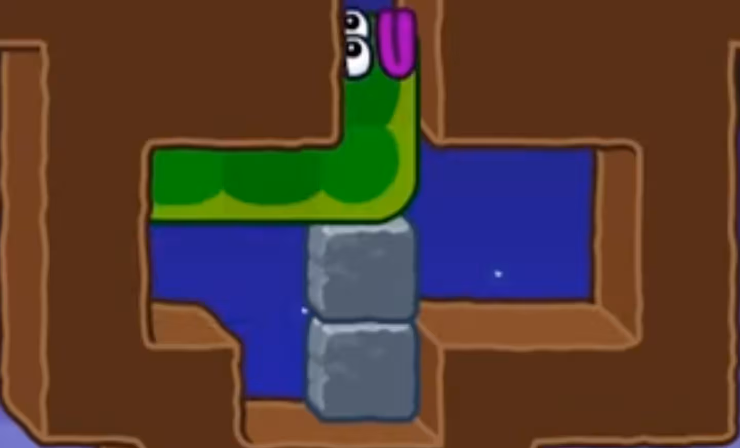 Apple Worm Level 18 Step 7: Move right one step and climb up using the stacked stones to get out of the dirt pit