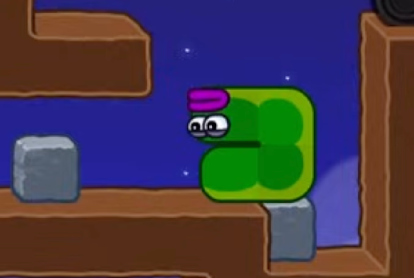 Apple Worm Level 20 Step 15: Move above the right stone block and shift left for the final setup