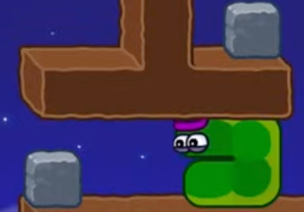Apple Worm Level 20 Step 7: Push the stone right one step onto the edge, then go over it to the upper-right edge