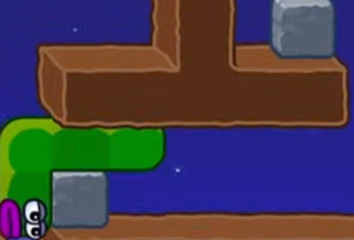 Apple Worm Level 20 Step 8: Move to the left side of the stone block to set up the next pushes